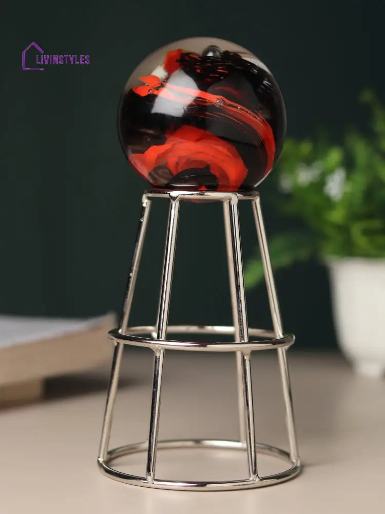 Crystal Orb’s Silver Pedestal With Red Ball Table Decor