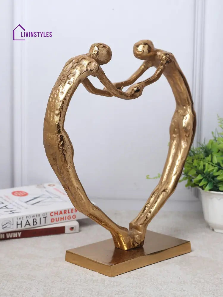 Heartfelt Harmony Sculpture In Gold