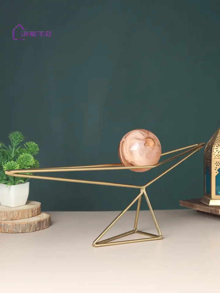 Orb’s Triangular Nexus With Peach Ball Table Decor