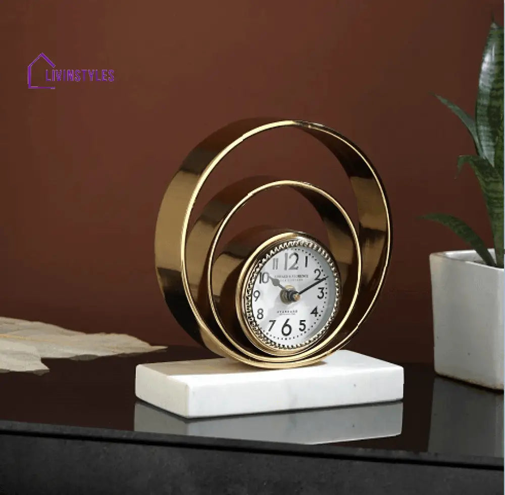 Rings Of Saturn Desk Clock In Marble & Gold Finish