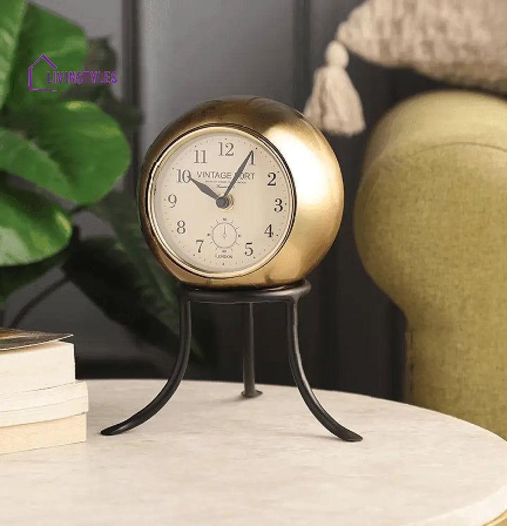 Seated Sphere Clock In Gold & Black Colour