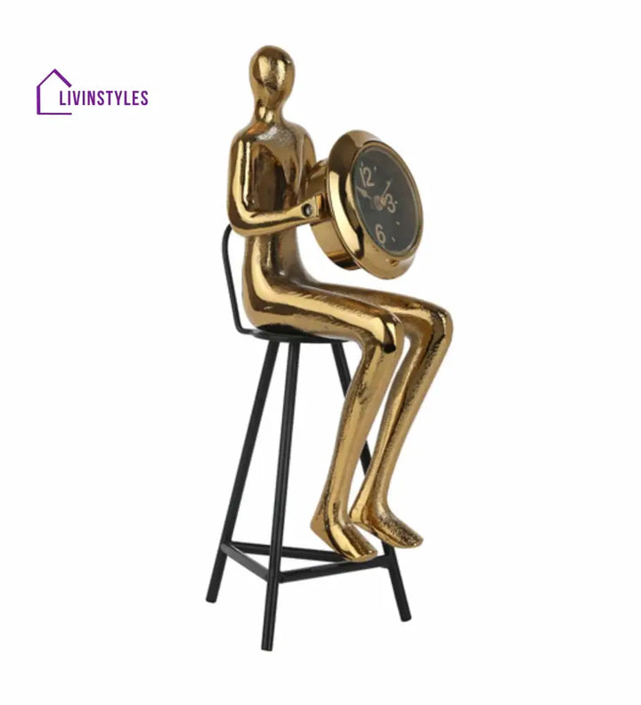 Sitting Man Clock In Gold