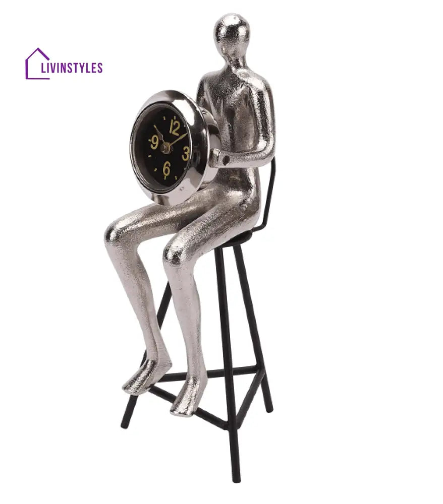 Sitting Man Clock Silver