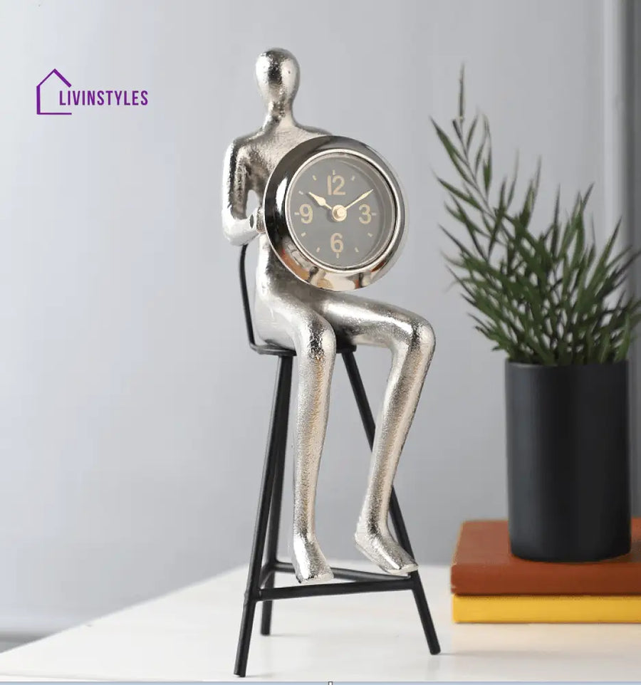 Sitting Man Clock Silver