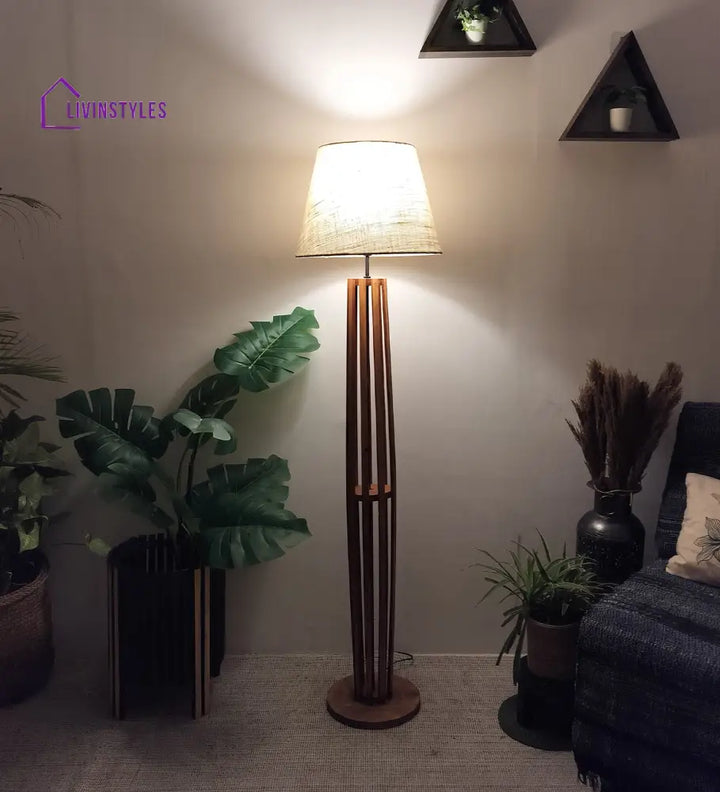 Tall Boy Wooden Floor Lamp With Brown Base And Beige Fabric Lampshade Lamps